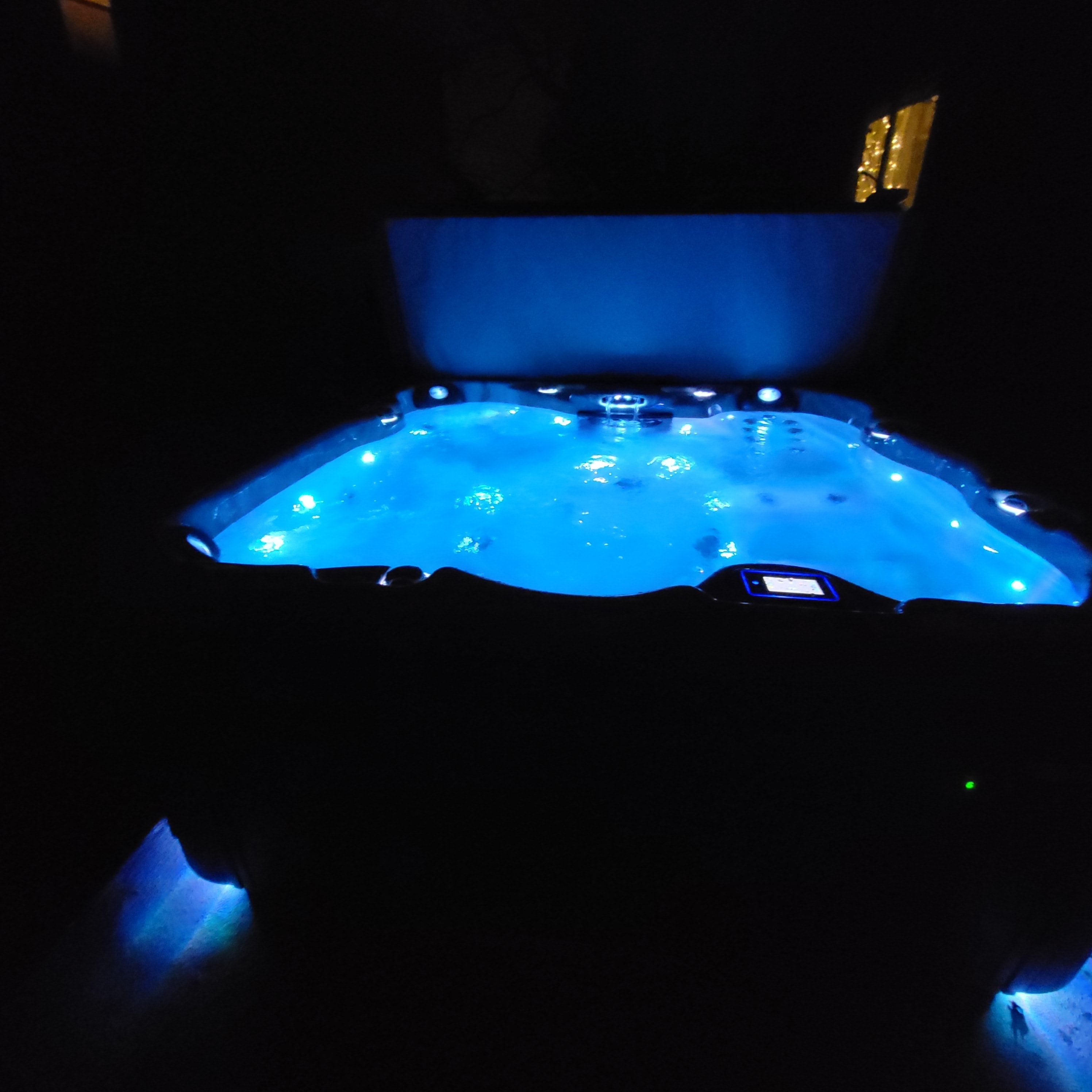 Hot tub jets bubbling water close up hydrotherapy